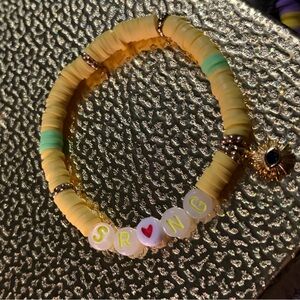 Gold tone beaded bracelets “Strong”